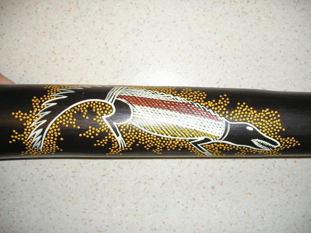 Le dessin qui figure sur l'autre coter (bah wi) et au fait qq pourais me dir ce que c'est? j'en vois partout sur ce forum...